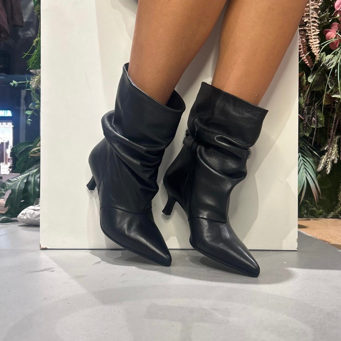 rachel tronchetto aricciato