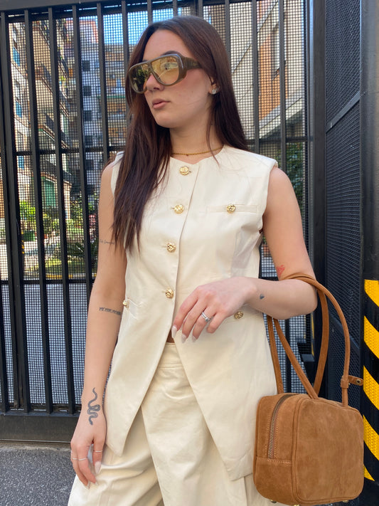 lumina gilet bottoni oro