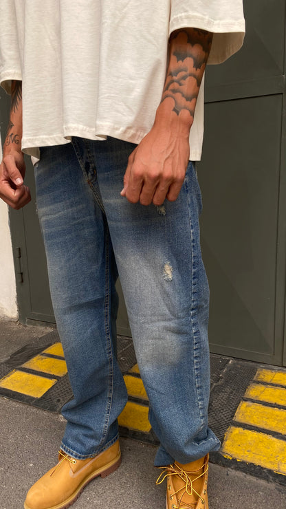 duca jeans strappi