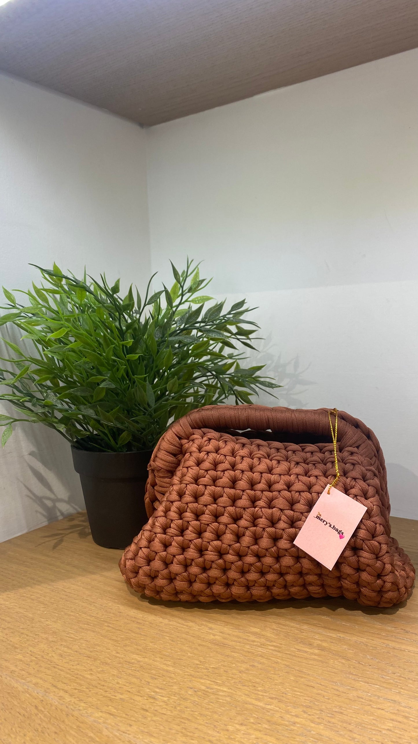 clutch tessuto intrecciato