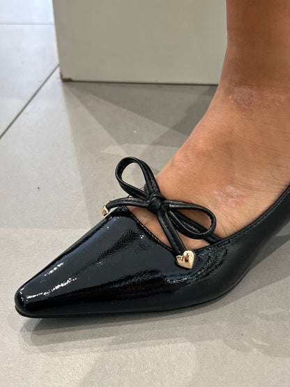 gold decollete fiocco