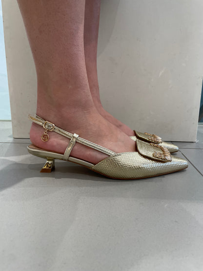 gold sling back tacco concavo