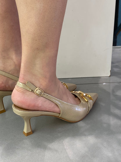 gold sling back accessorio