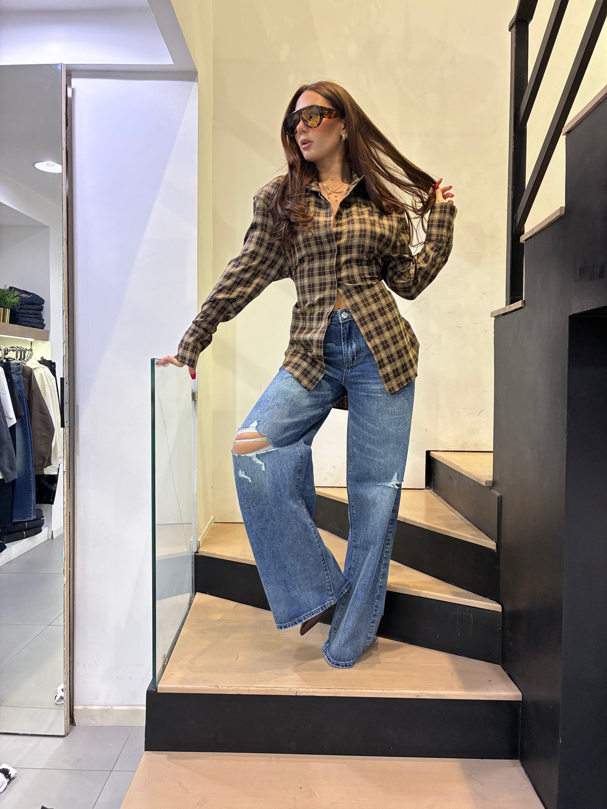 monique jeans strappi