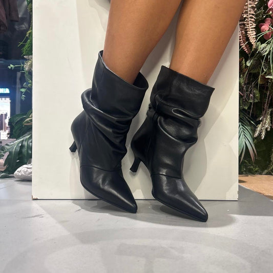 rachel tronchetto aricciato