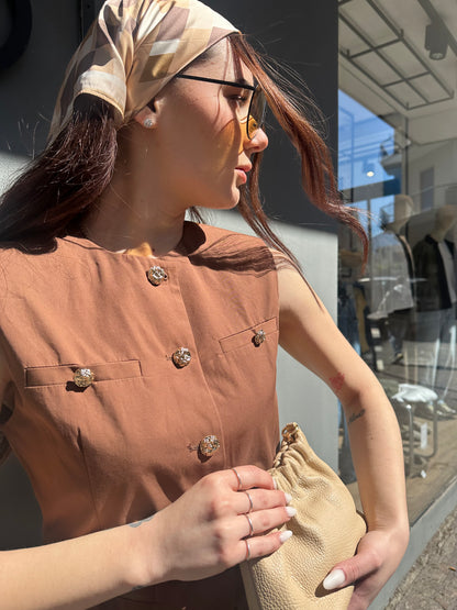 lumina gilet bottoni oro
