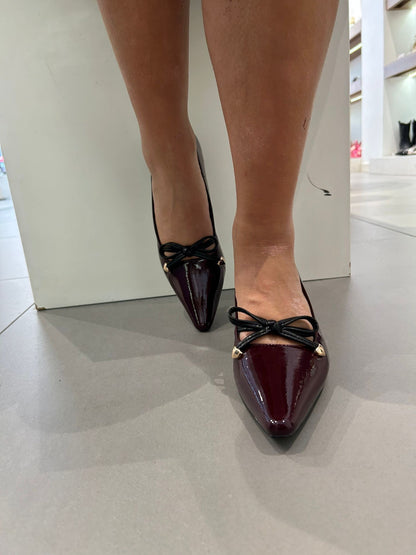 gold decollete fiocco